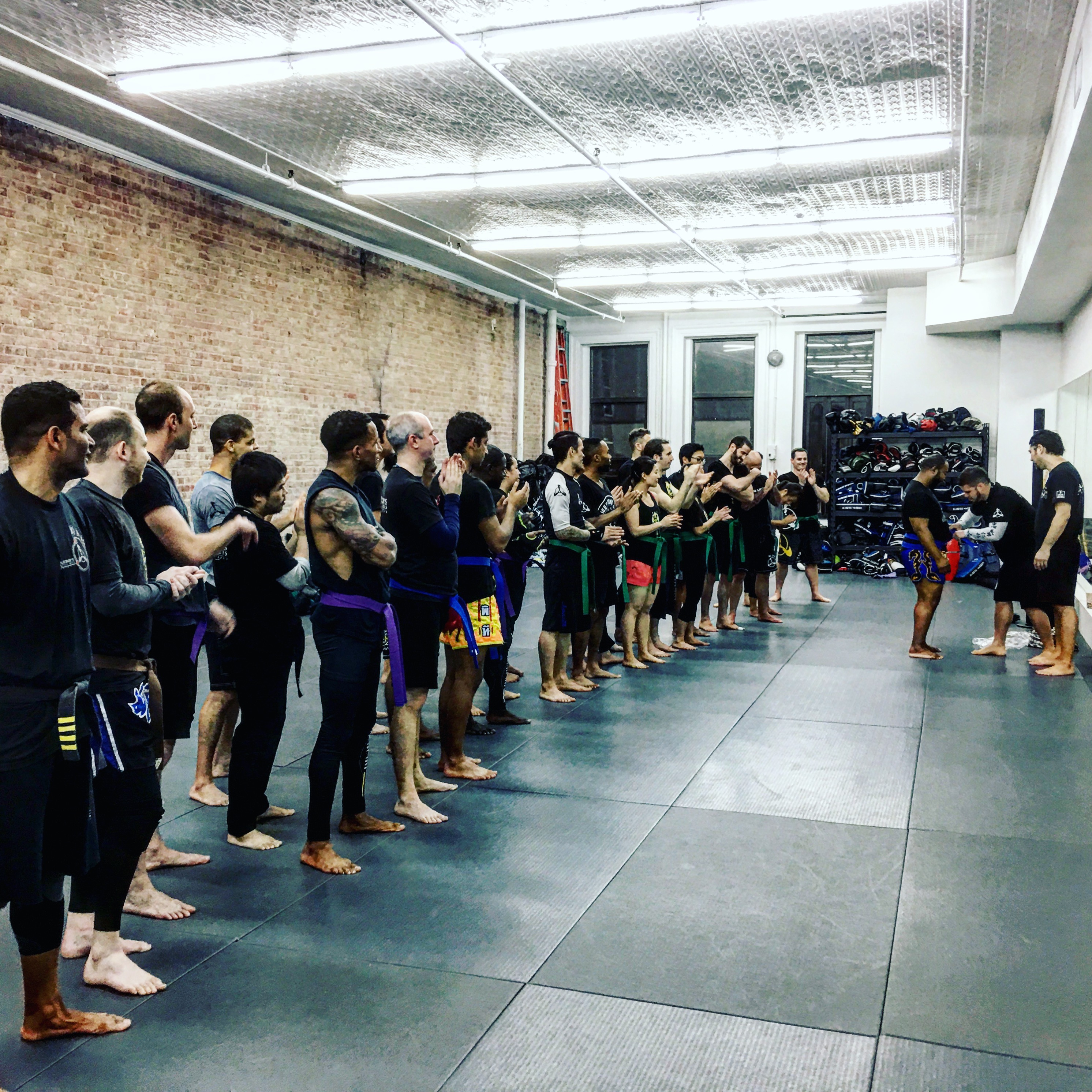 Gym full of students about to start a class at Anderson's Martial Arts Academy
